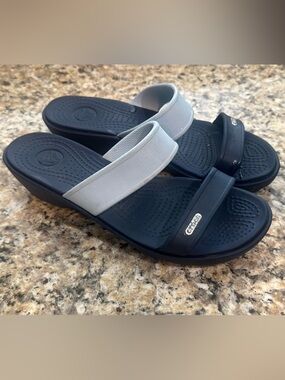 CROCS two-strap slides in navy and light blue